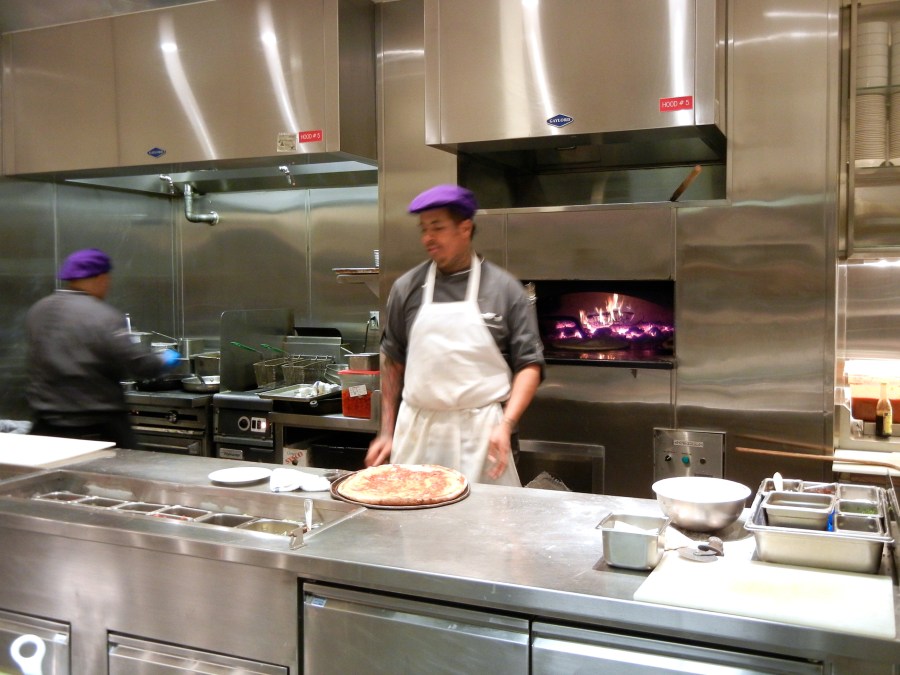 "Interactive kitchen" means you can watch them cook.