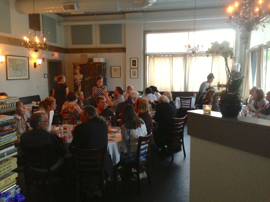 Table for four? The dining room is to the right.