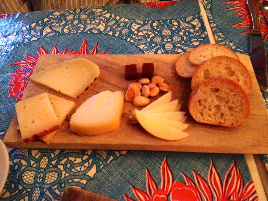 Cheese, almonds, apples, quince and crostini.
